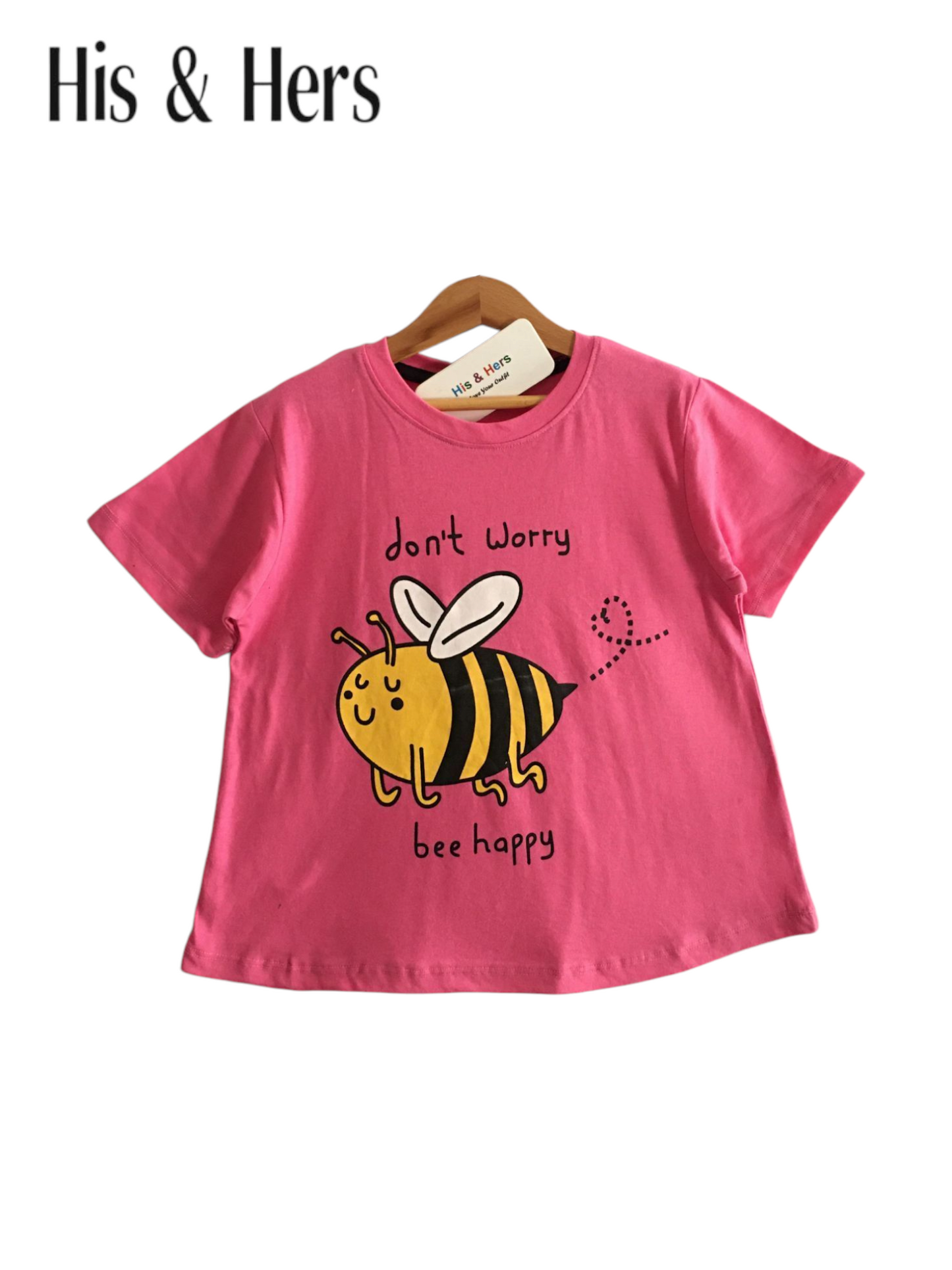 Pink girls t-shirt with cute bee graphic and “bee happy” text print, soft cotton fabric in Pakistan.