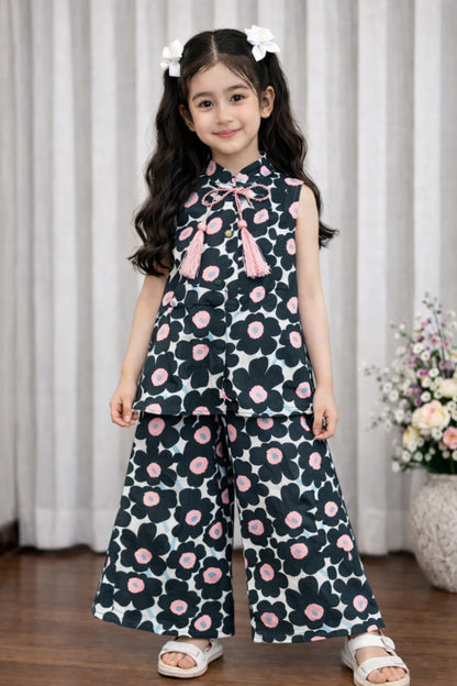 Black floral cotton girls co-ord set with tassel top and wide-leg pants, studio Pakistan