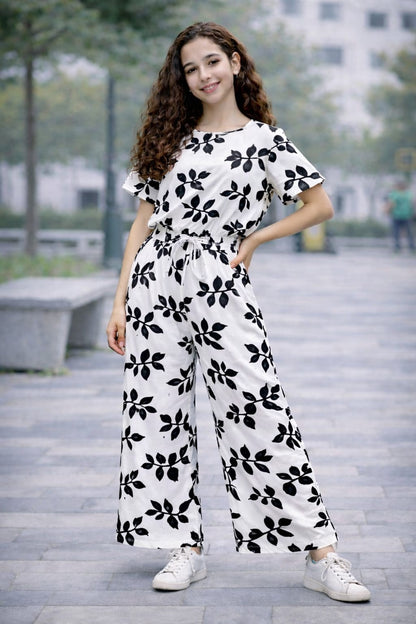 White cotton girls co-ord set with black leaf print, short sleeve top and wide-leg pants, Pakistan kids Outfit