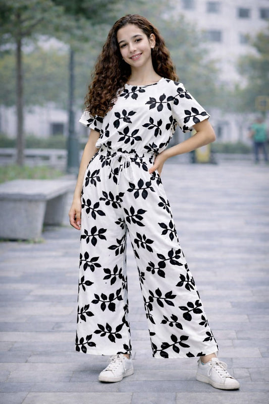 White cotton girls co-ord set with black leaf print, short sleeve top and wide-leg pants, Pakistan kids Outfit