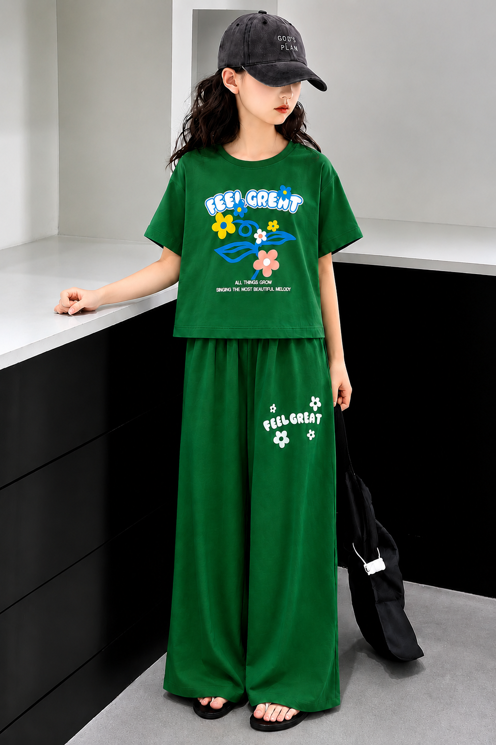 Cute White [Feel Great ] co-ord set with soft jersey fabric and green  wide-leg trousers for girls in Pakistan.