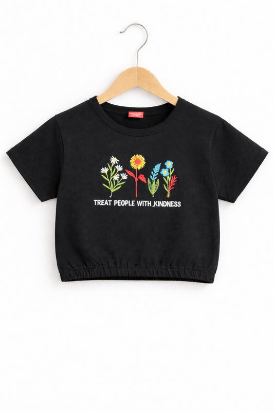 Girls black cotton crop t-shirt with colorful floral embroidery and “Treat People With Kindness” text, Pakistan casual summer Kidswear 
