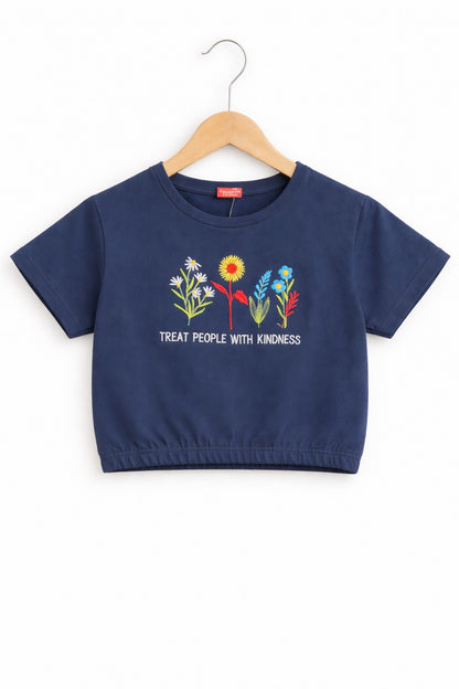 Girls navy blue cotton crop t-shirt with colorful floral embroidery and “Treat People With Kindness” text, Pakistan casual summer Kidswear