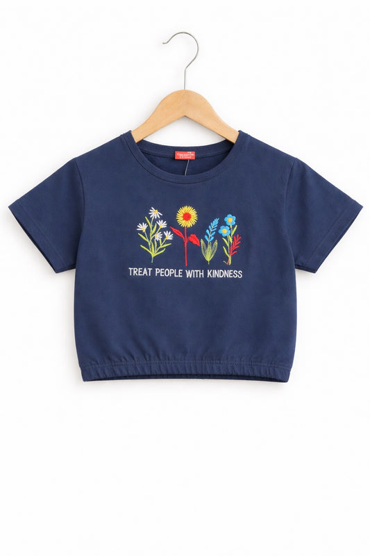 Girls navy blue cotton crop t-shirt with colorful floral embroidery and “Treat People With Kindness” text, Pakistan casual summer Kidswear