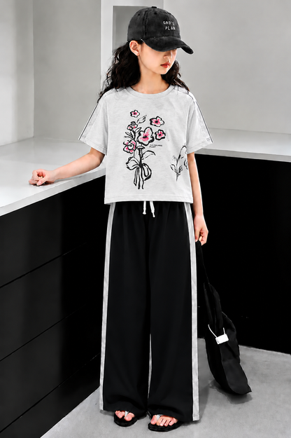 Grey floral print girls’ co-ord set with wide-leg pants, stylish summer outfit for kids in Pakistan.
