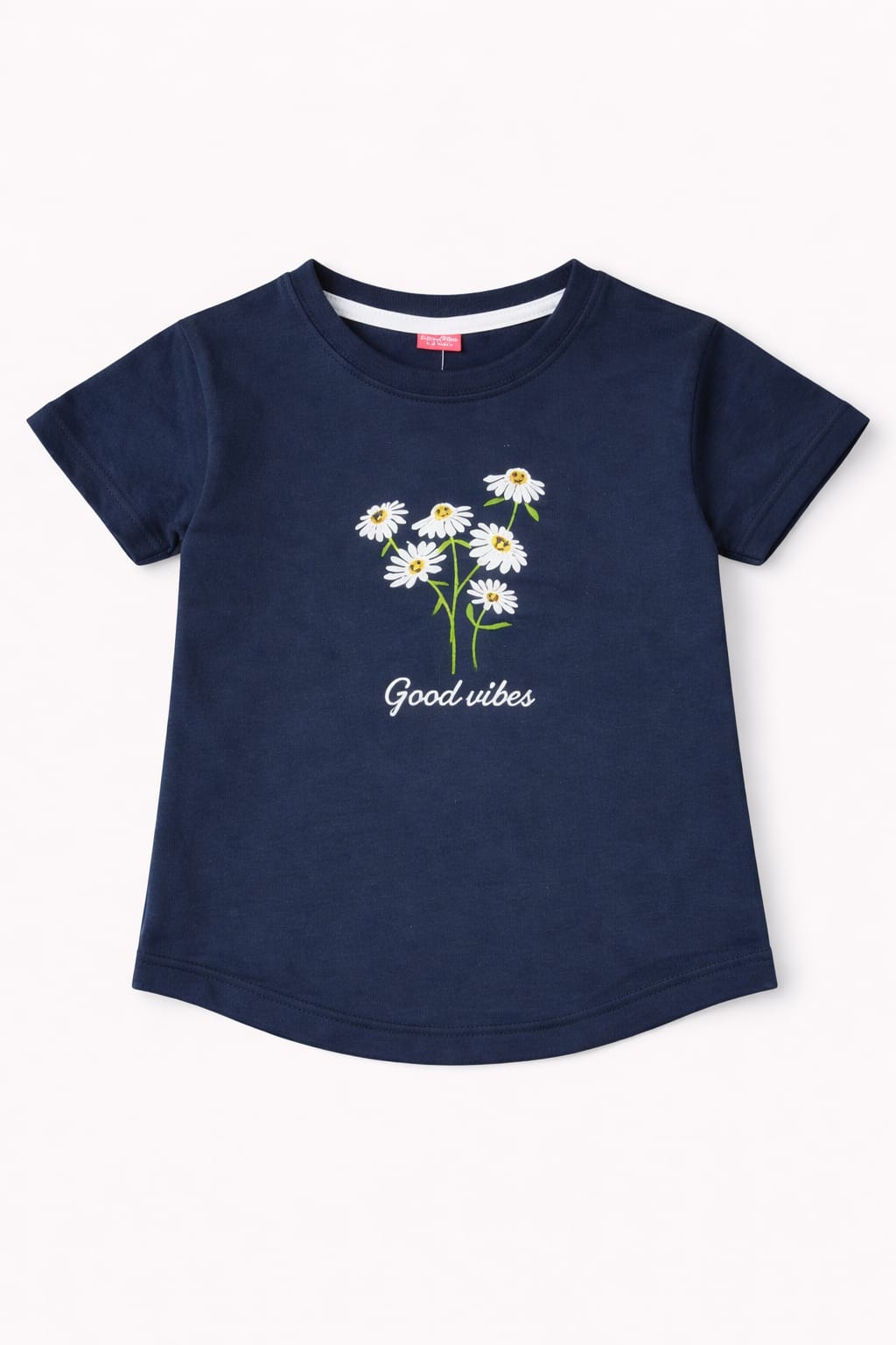 Navy blue girls t-shirt with daisy flower print and “Good vibes” text design in Pakistan.
