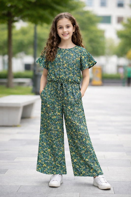 Green cotton girls co-ord set with yellow floral print, short sleeve top and wide-leg pants, casual outdoor street style Pakistan
