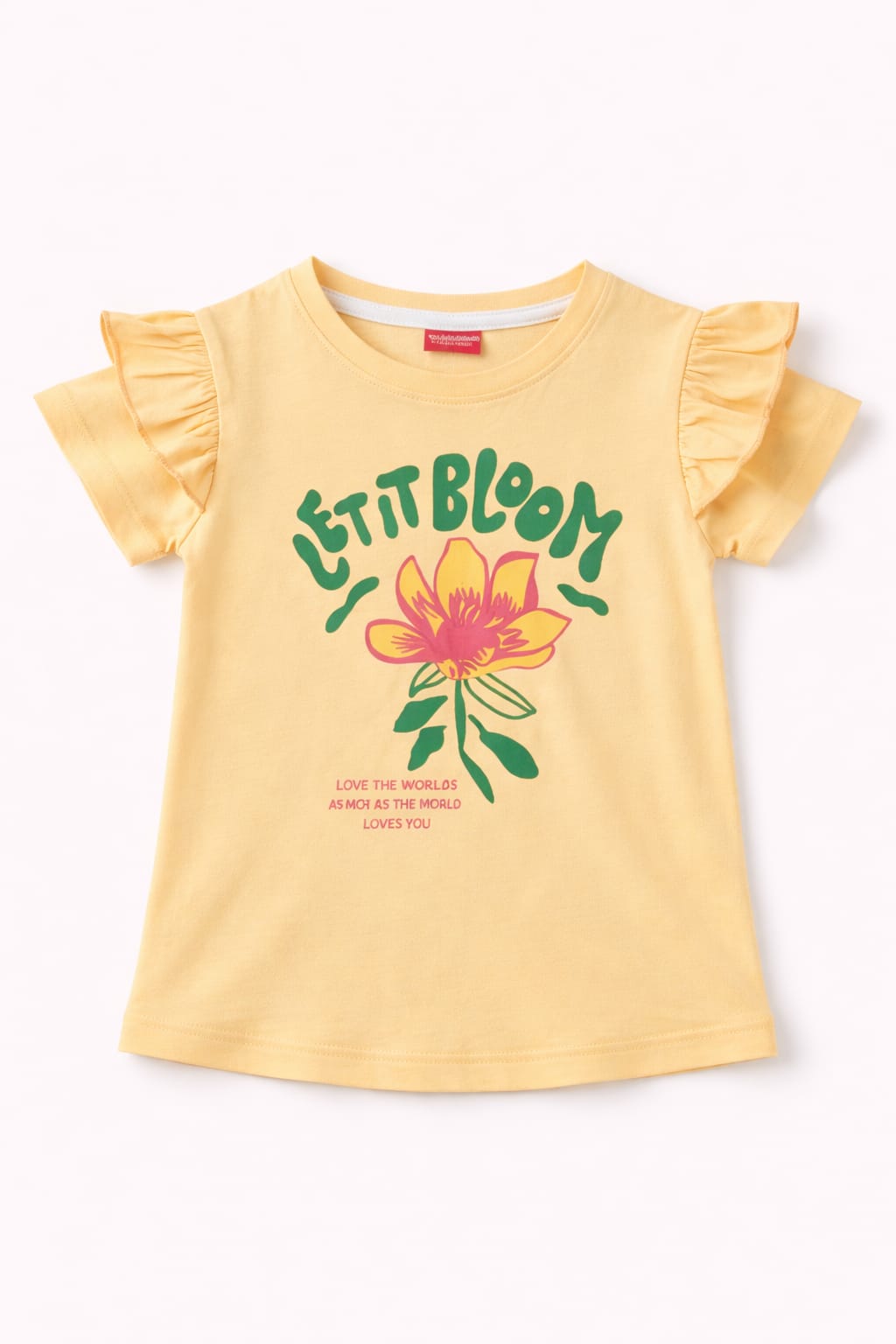 Light yellow girls ruffle sleeve t-shirt with “Let It Bloom” flower graphic print in Pakistan.
