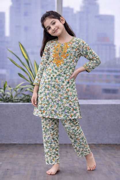 Green floral printed cotton 2-piece outfit for girls with embroidered neckline kurti and straight pants, Pakistan  