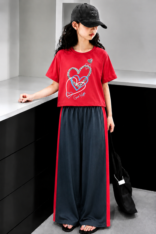Red and black girls’ heart print co-ord set with wide-leg pants, stylish summer outfit for kids in Pakistan.
