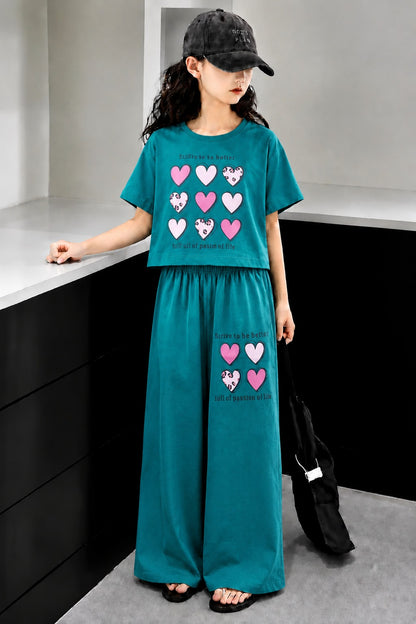 Teal girls’ heart print co-Ord set with graphic crop top and matching wide-leg pants summer outfit for kids in Pakistan.
