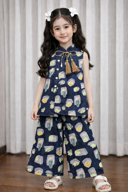 Navy blue printed cotton girls co-ord set with sleeveless tassel top and wide-leg pants, kids outfit Pakistan.
