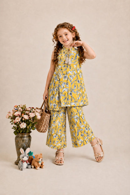 Yellow floral printed sleeveless girls co-ord set with wide leg pants, tassel neckline detail, and matching trousers Pakistan Outfit