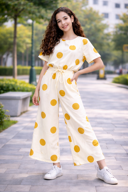 Girls off-white cotton co-ord set with yellow polka dots, short sleeve top and wide-leg pants, kids outfit Pakistan.