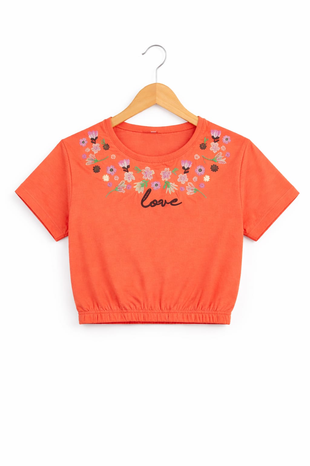 Coral girls crop t-shirt with floral embroidery style “Love” print and elastic hem design in Pakistan.
