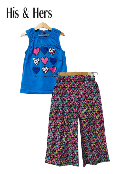 Blue cotton girls co-ord set with sleeveless graphic heart print top and multicolor floral wide-leg pants,kids outfit Pakistan.