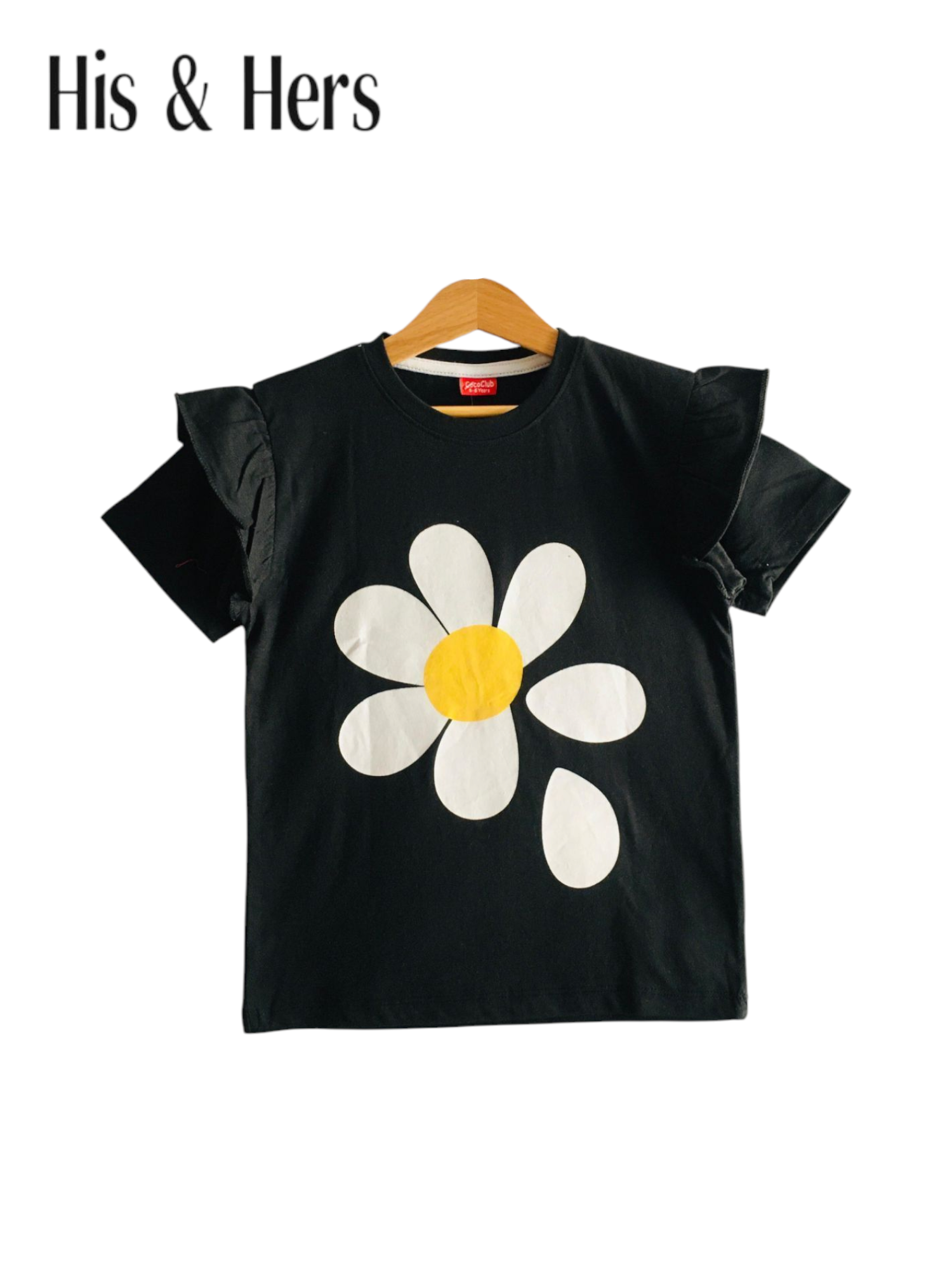 Black girls t-shirt with large white daisy flower print, flutter sleeves and soft cotton fabric in Pakistan.
