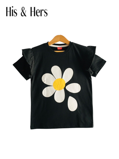 Black girls t-shirt with large white daisy flower print, flutter sleeves and soft cotton fabric in Pakistan.
