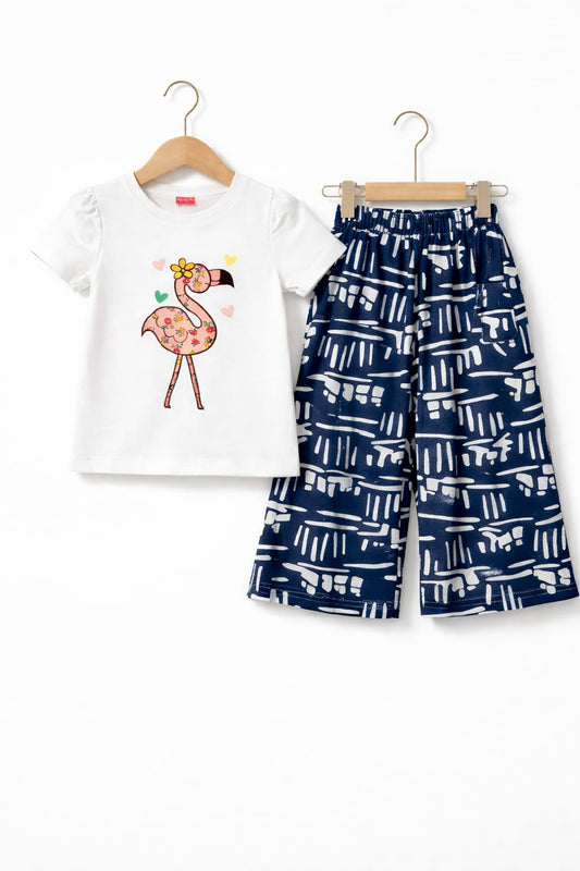 White girls co-ord set with flamingo print short sleeve T-shirt and navy abstract printed wide-leg pants, Pakistan
