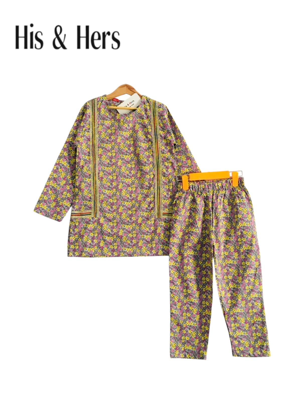 Floral printed cotton 2-piece outfit for girls with kurti and straight pants, studio background Pakistan

