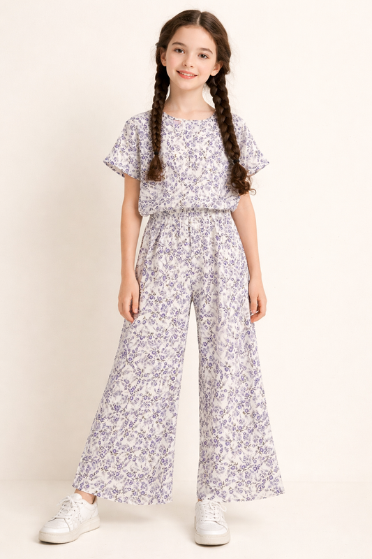 White purple floral cotton girls co-ord set with wide-leg pants indoor.