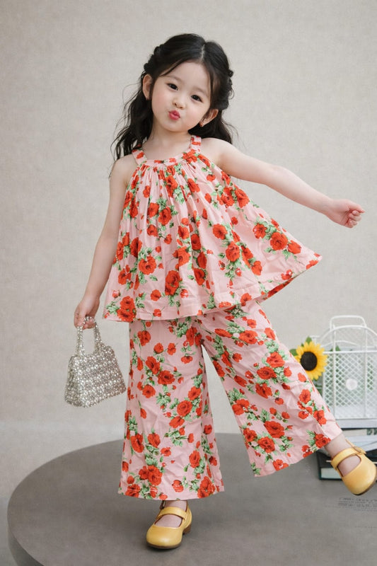 Girls pink floral sleeveless top and wide-leg pants co-ord set with red rose print, stylish summer kids wear Pakistan outfit 
