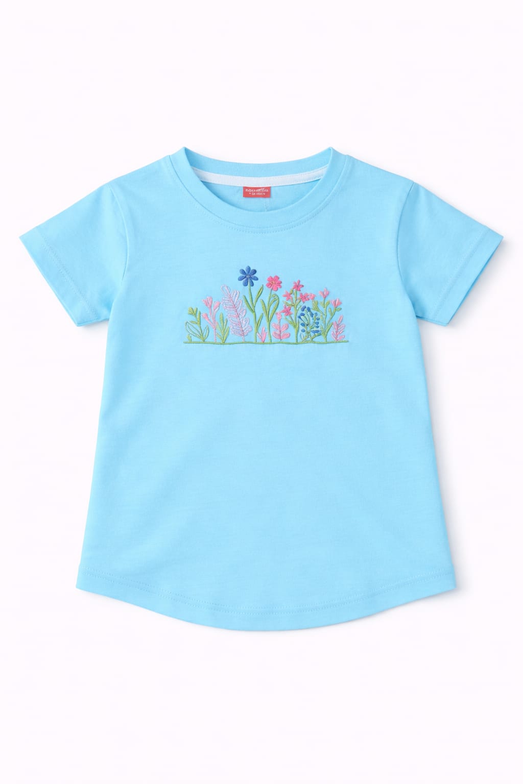 Sky blue girls t-shirt with delicate floral embroidery, short sleeves and soft cotton fabric in Pakistan.
