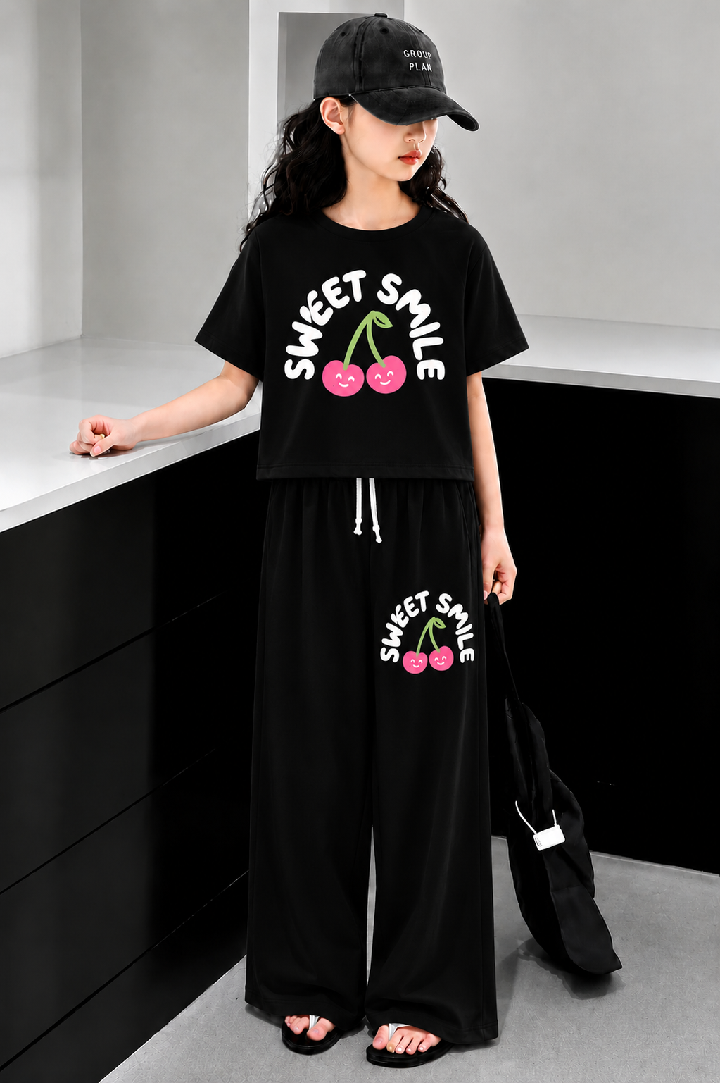Black girls cherry print co-ord set with crop t-shirt and wide leg trousers in Pakistan.
