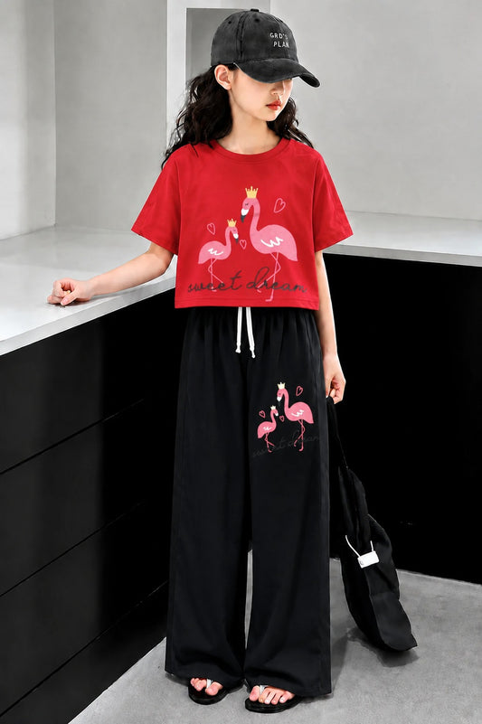 Red girls flamingo print co-ord set with crop t-shirt and black wide leg trousers in Pakistan.
