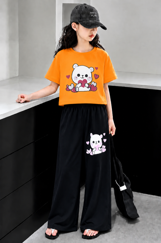 Cute White teddy bear co-ord set with soft jersey fabric and black wide-leg trousers for girls in Pakistan.