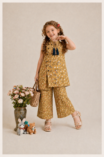 Mustard cotton girls co-ord set with delicate floral print, sleeveless top with tassel detail and wide-leg pants, Pakistan kids Outfit