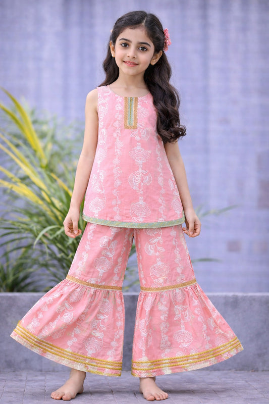 Girls pink cotton floral printed kurti gharara set with gold trim, Pakistani outfit