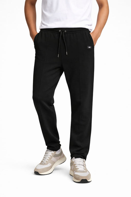 Black jogger trouser for men with stretch waist and pockets.