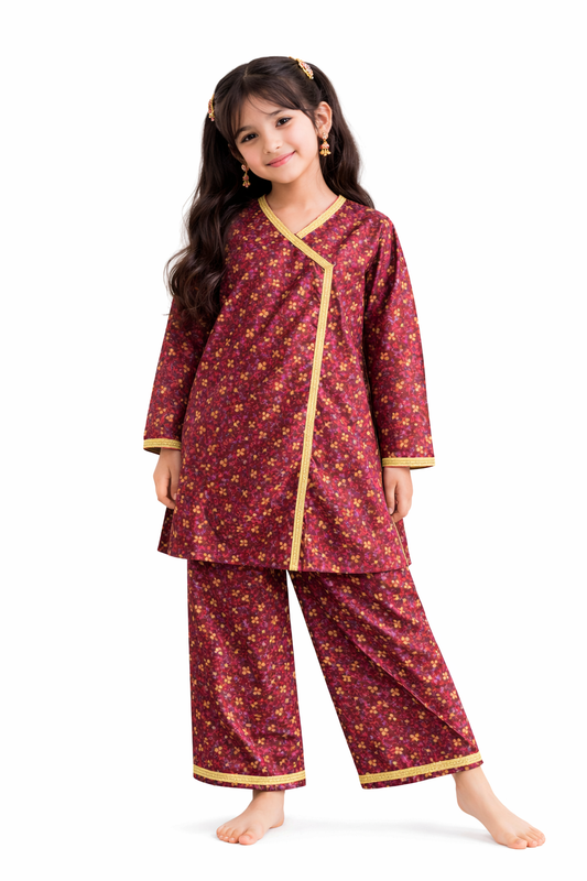 Maroon floral cotton 2-piece girls outfit with wrap-style kurti and straight pants, studio background Pakistan
