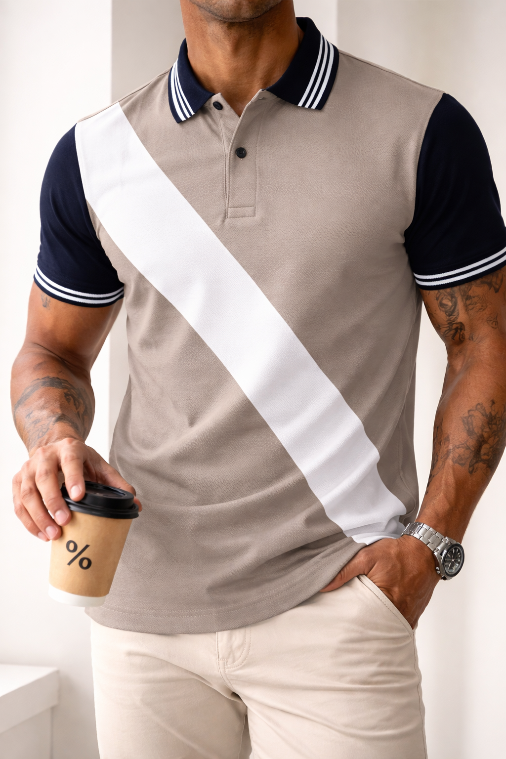 Men’s fashion polo t-shirt in beige with navy accents and bold stripe pattern modern outfit Pakistan.